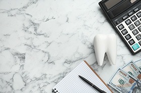 Tooth model, calculator, and notebook