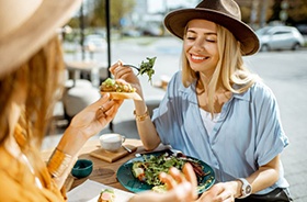 Two female friends enjoying a meal together