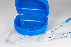 Teeth whitening kit with custom trays